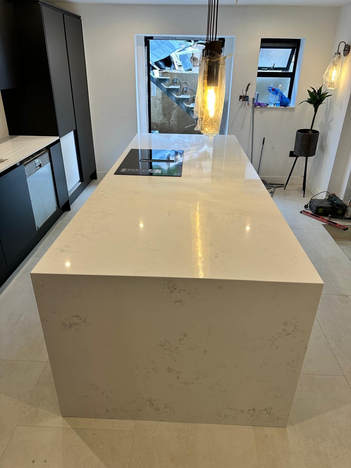 Modern quartz kitchen island installed by Levant Kitchen Worktops
